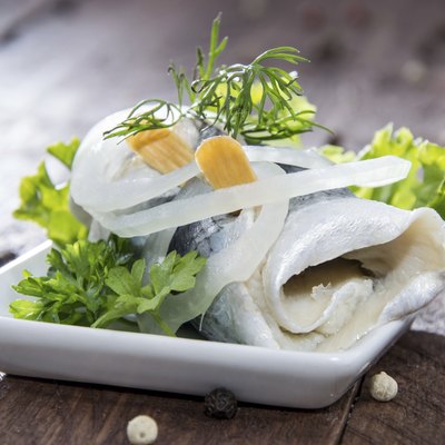Fresh made Rollmop on a plate