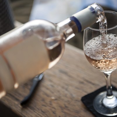 White wine pouring into glass