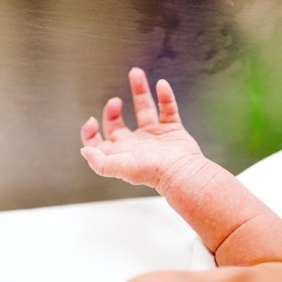 a baby in an incubator
