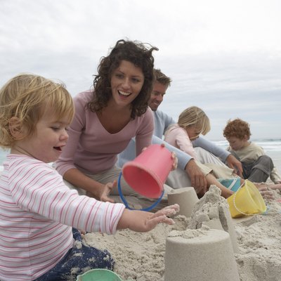 Family playing at beach