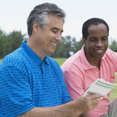 Multi-ethnic men on golf course