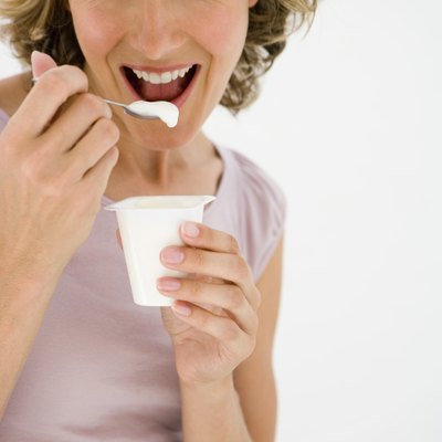 Woman eating yogurt