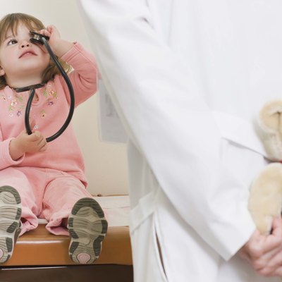 Girl playing with stethoscope