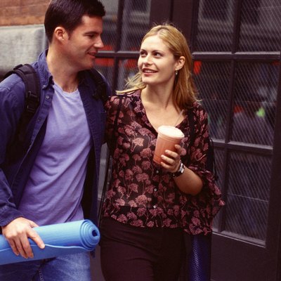 Couple with yoga mat