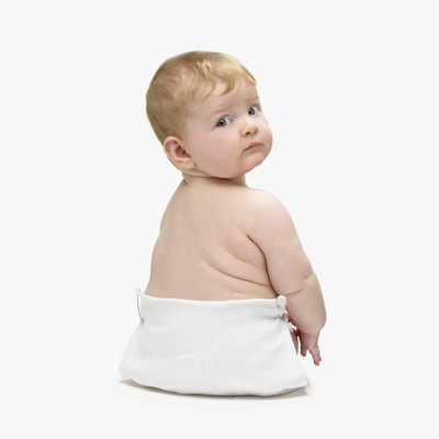 Baby looking over shoulder