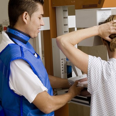 Radiologist taking an x-ray of a patient