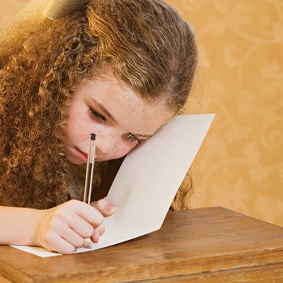Girl writing a greetings card