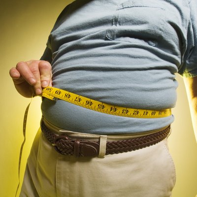 Man measuring his waist