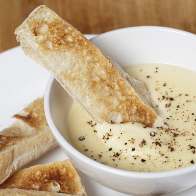 Toast in cheese dip sauce