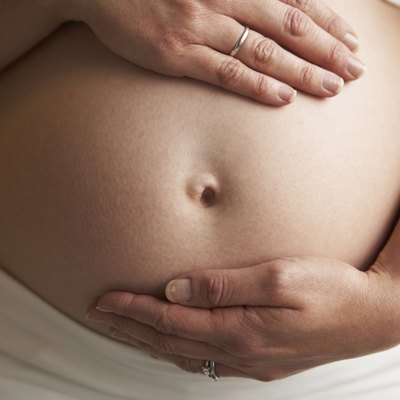 Close Up Portrait Of 5 months Pregnant Woman