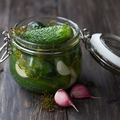 Glass jar of fresh low-salt pickled cucumbers