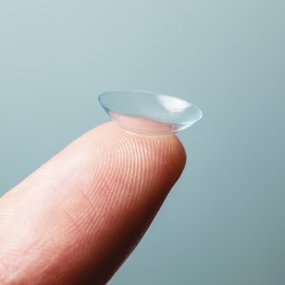 Contact lens on finger