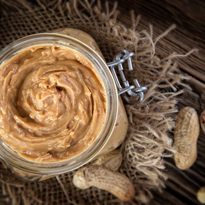 Peanut butter on wooden ground
