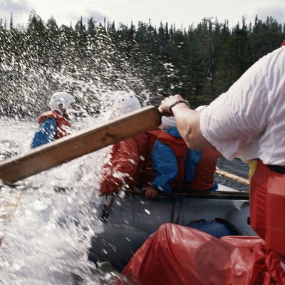 Group of people in canoe, close-up