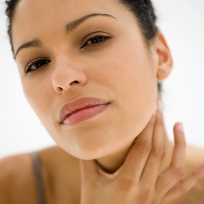 Woman feeling glands
