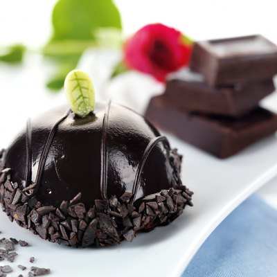 chocolate bomb pastry with a red rose