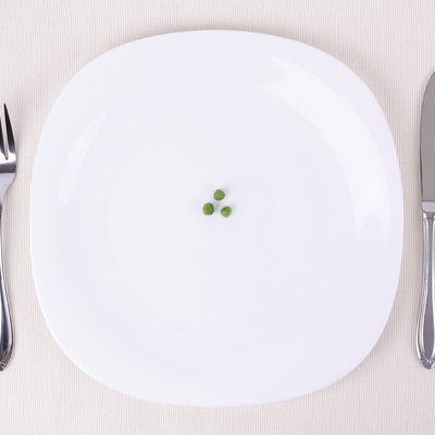 Small portion of food on a big plate