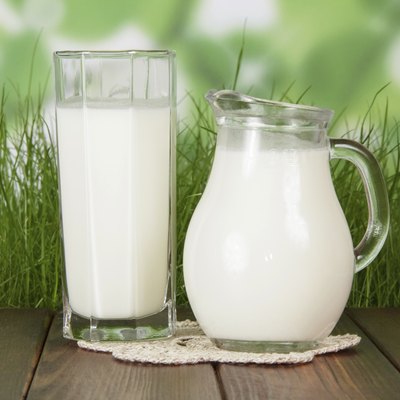 Milk jug on wooden desk