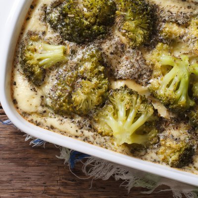 Broccoli casserole close-up on the table. horizontal top view