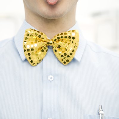 Man Wearing Bow Tie and Sticking Out Tongue