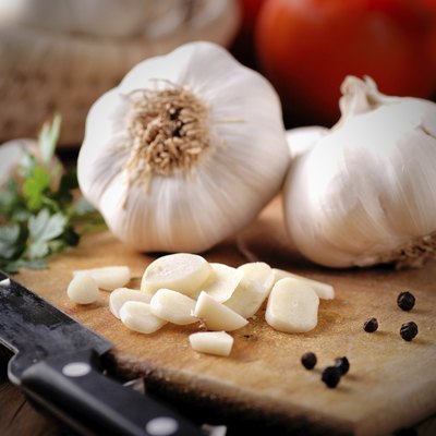 fresh garlic on wooden table
