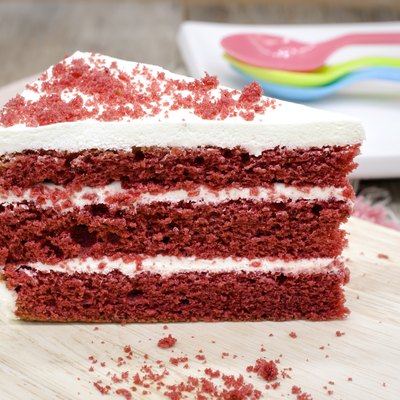 Red velvet cake on a wooden background