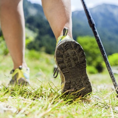 Nordic walking hiking sport shoes in mountains
