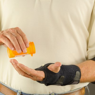 Man taking pain anti-inflammatory tendinitis medication