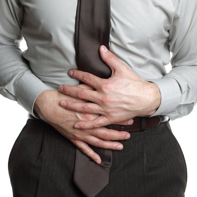 Businessman with stomach ache