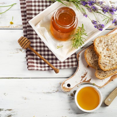 Jar of honey and toast for breakfast.