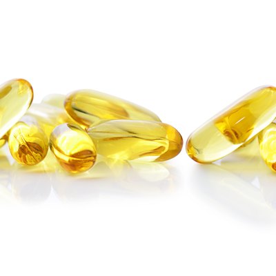 Cod liver oil omega 3 gel capsules isolated on white