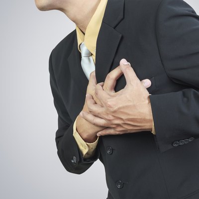 businessman having heart attack