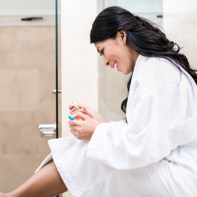 Asian woman being joyfully pregnant