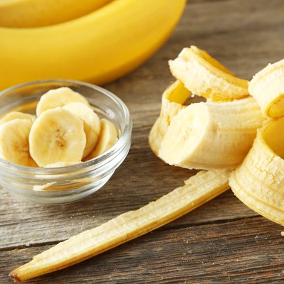 Bananas on grey wooden background