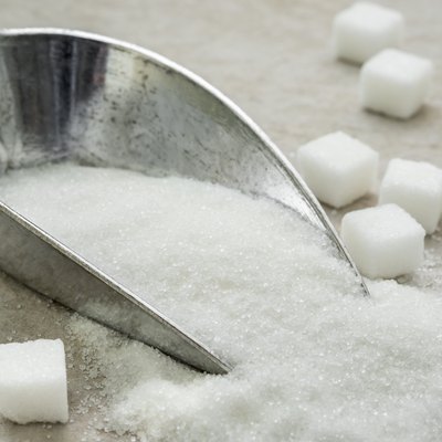 Sugar on metal scoop