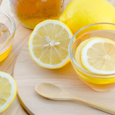 Honey lemon tea on wooden table