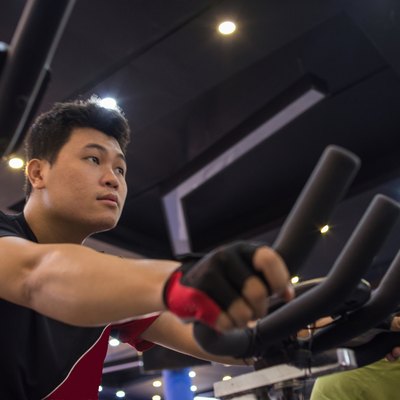 Man focus on doing exercise in the gym