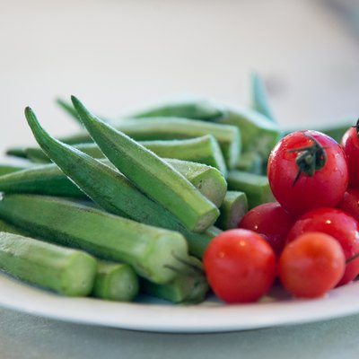 okra and cherry tomatoes on a plate