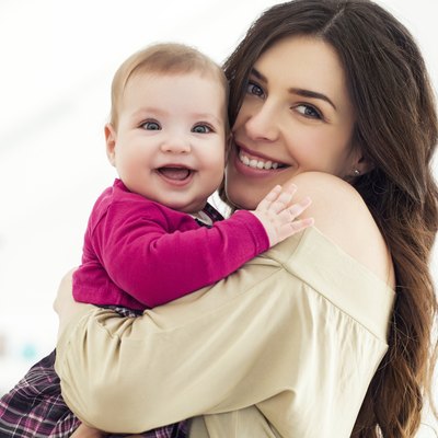 Mother Holding Baby Girl