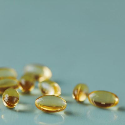 vitamin E tocopherol capsule tablet or pill with copy space