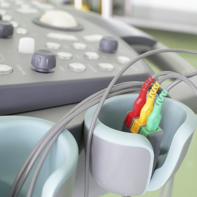 Fragment of an ultrasound machine. Color ECG sensors.