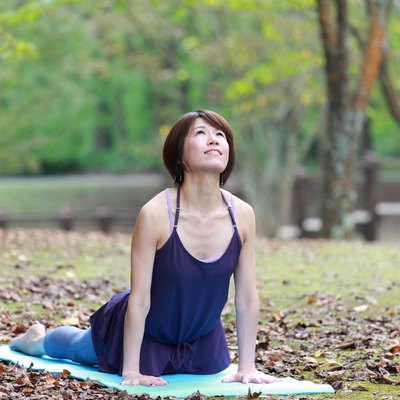 Japanese Woman Doing YOGA "cobra pose"