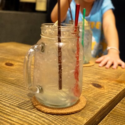 Kid is drinking Lemon Cocktail