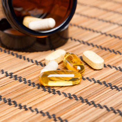Multivitamin Pills in a brown medicine jar