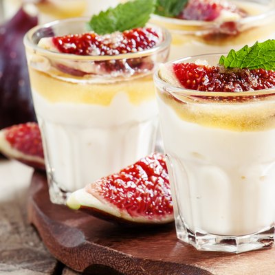 Creamy white yogurt with honey, figs and mint