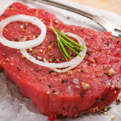 Raw beef steak and spices