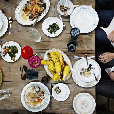 Overhead view of friends dining mid-meal