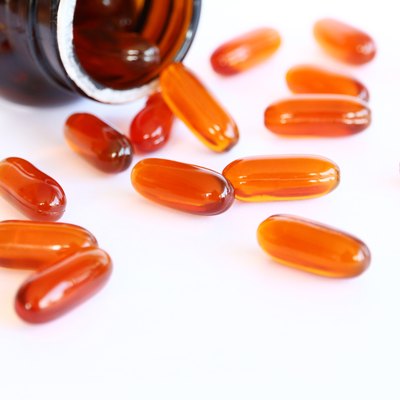 gel vitamin supplements on white
