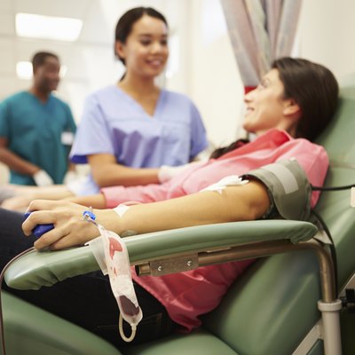 Blood Donors Making Donation In Hospital