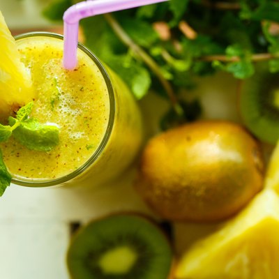 Smoothies of kiwi and pineapple on the table. Top view
